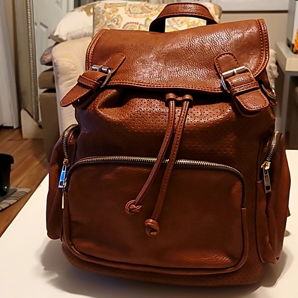 Lovely convertible backpack in brown-chestnut color vegan leather